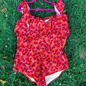 Swimsuit in red dots print
